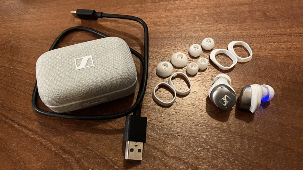 Sennheiser Momentum True Wireless 5 earbuds showcased with a sleek design, highlighting the latest wireless audio upgrade.